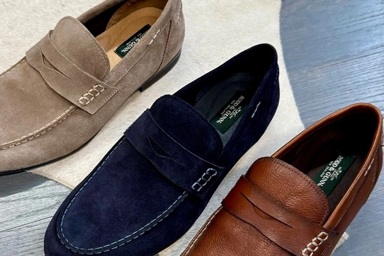 a trio of versatile men's loafers in beige, navy, and brown